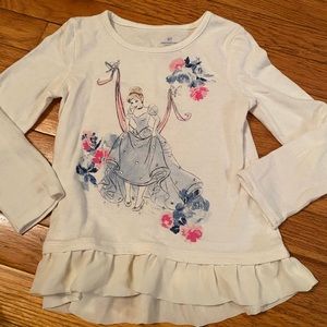 Jumping Beans Cinderella long sleeve shirt. Sweater feel with tutu bottom style.